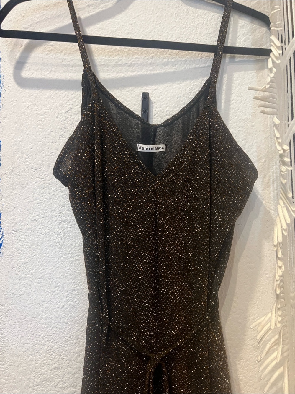 Reformation Black jumpsuit with Gold Metallic Detail